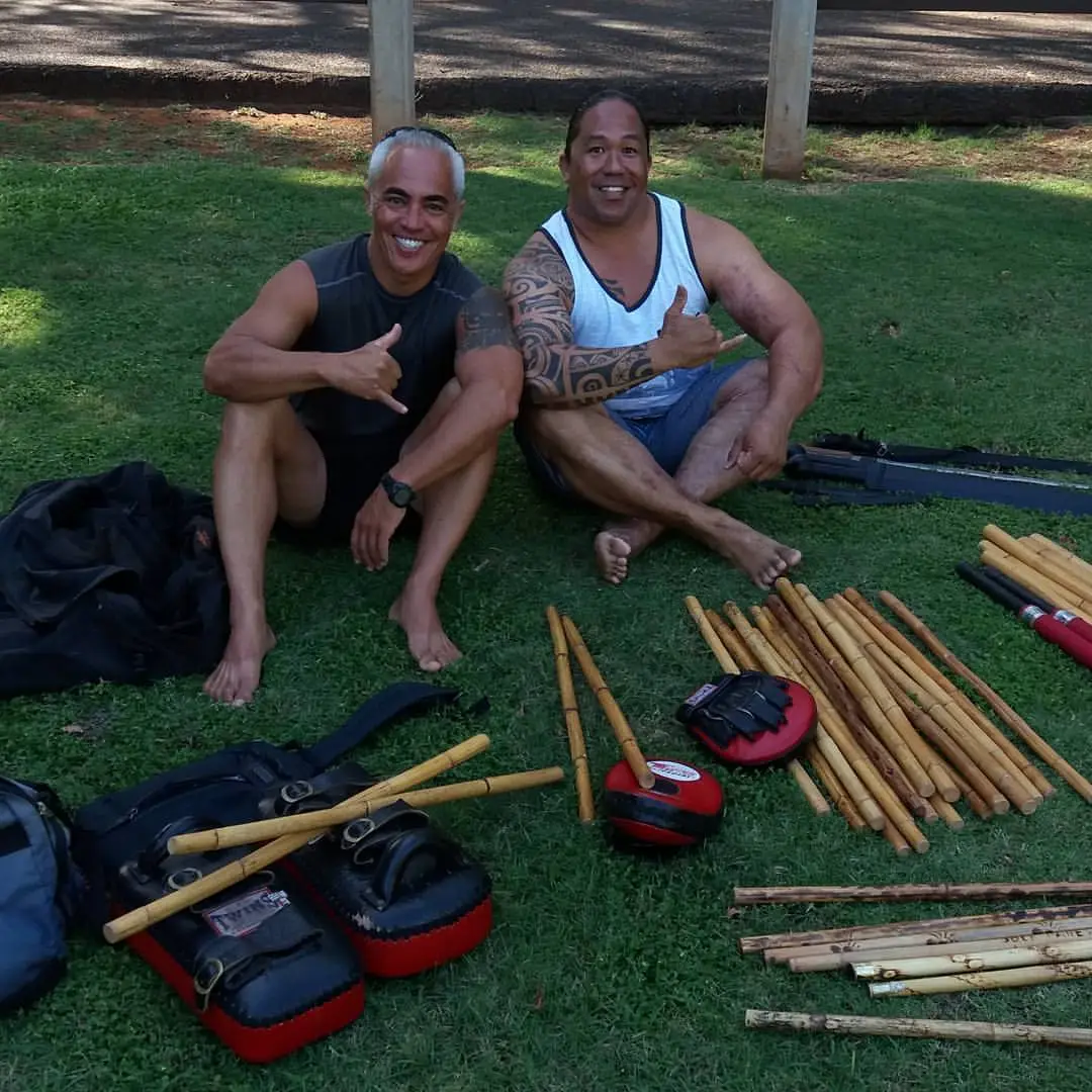 Karol Krauser with Kali Eskrima training equipment rattan sticks pads in Maui Hawaii