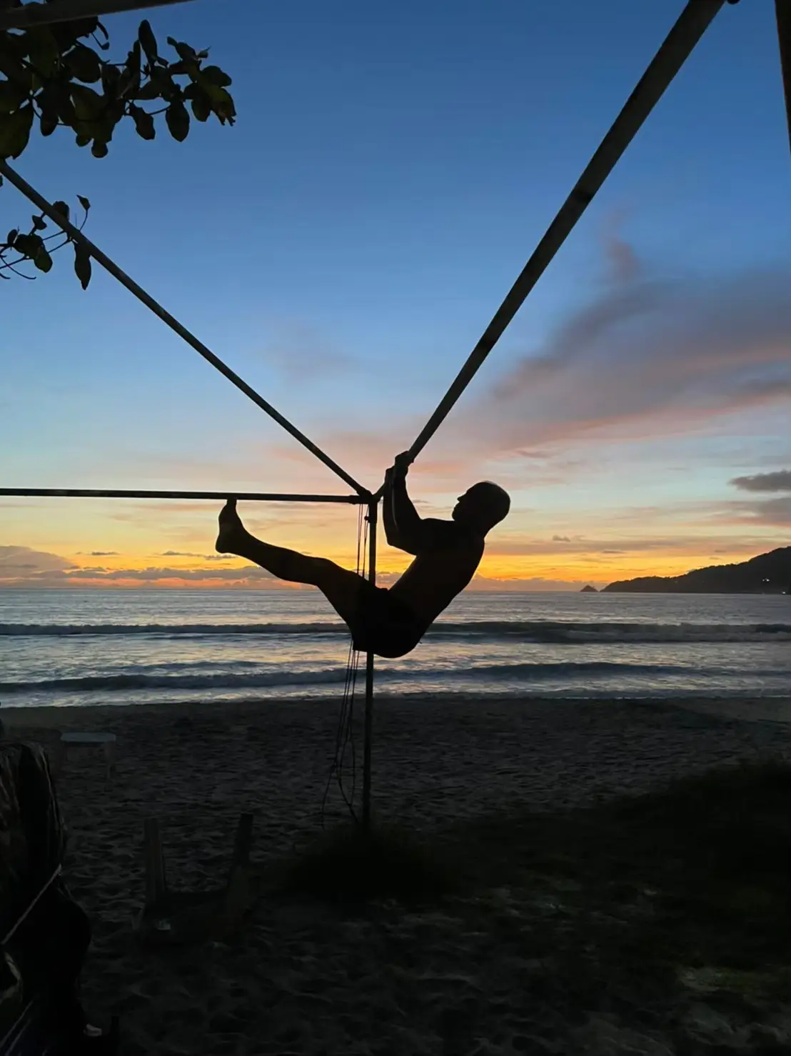 Outdoor fitness training at sunset on Phuket beach